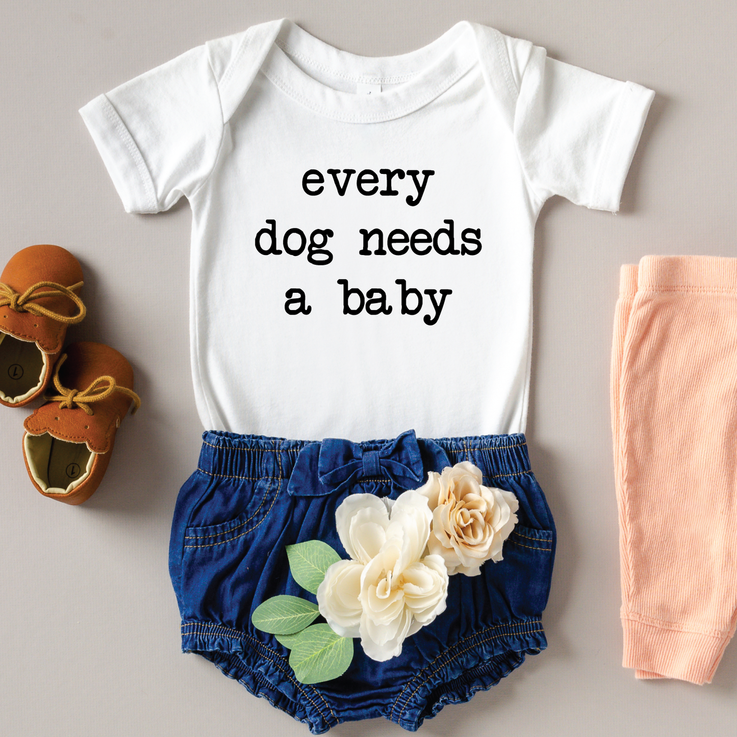 Eden and Eve Clothing Company - Every dog needs a baby onesie