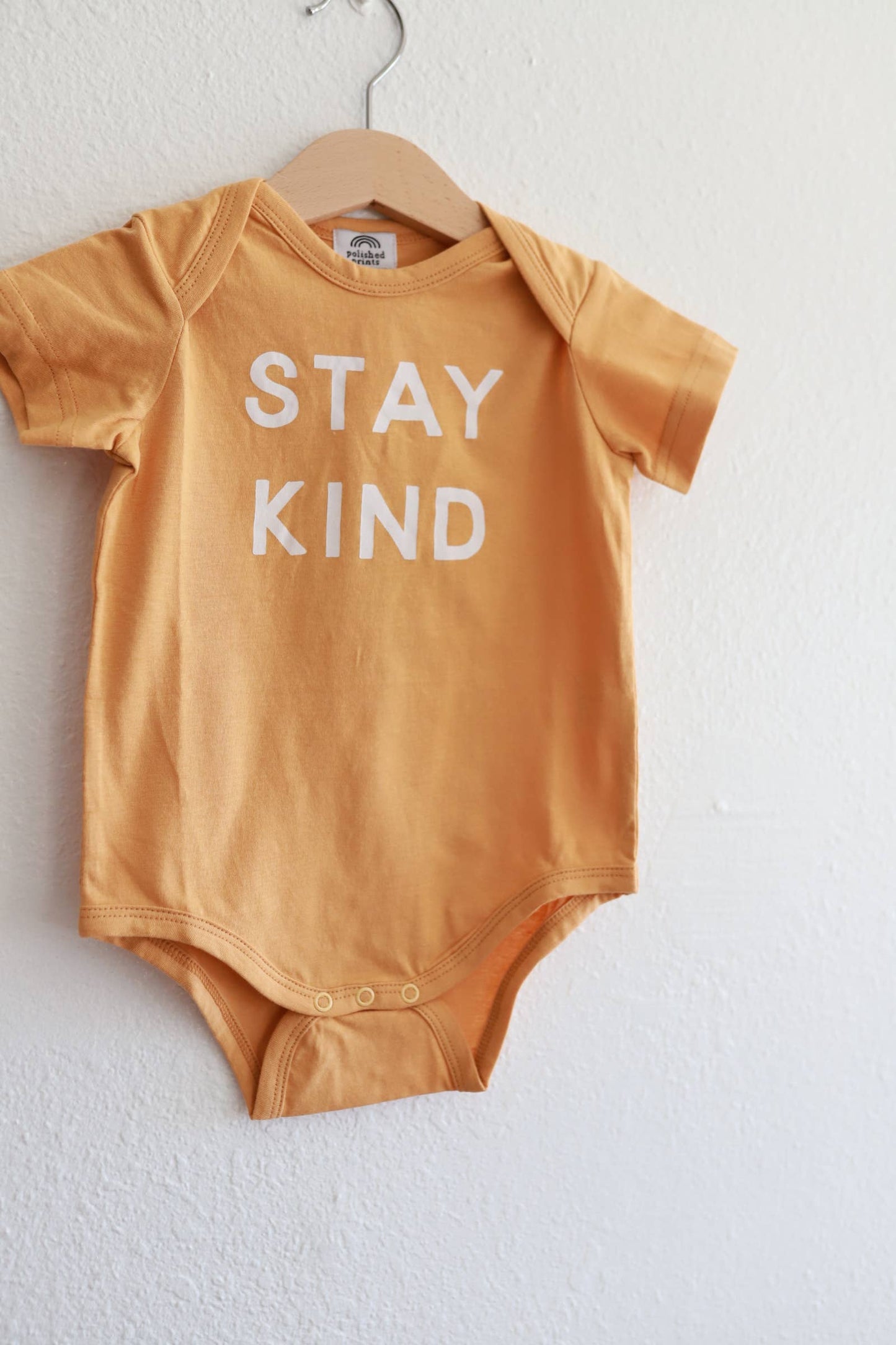 Polished Prints - Stay Kind Onesie