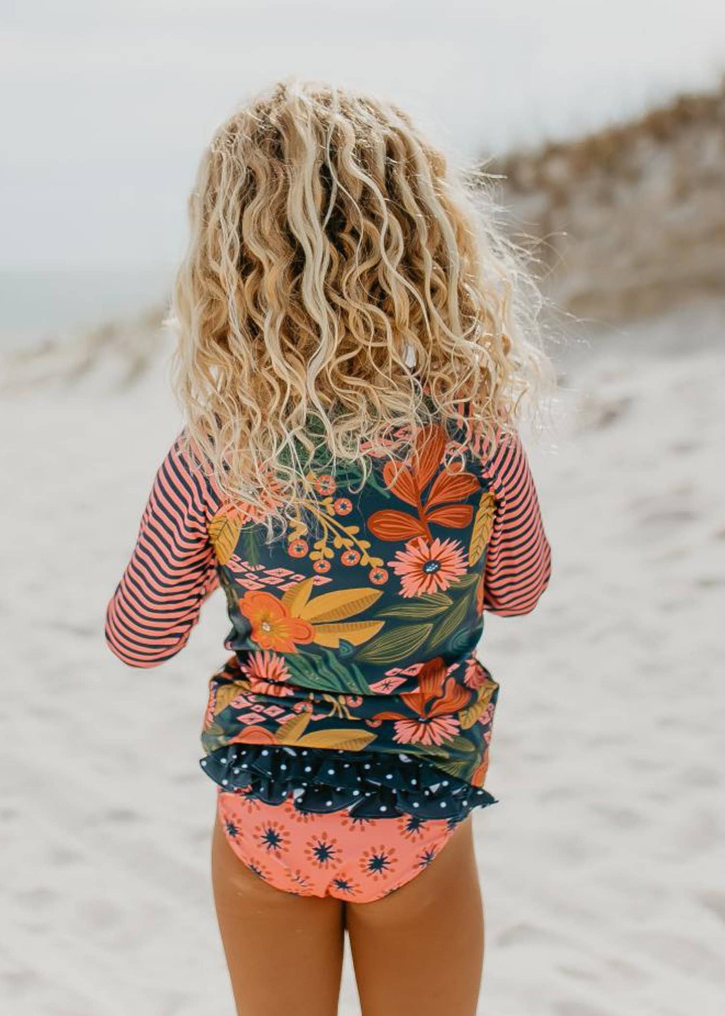 Oopsie Daisy - Kids Long Sleeve Navy Tropical Rash Guard Ruffle Swimsuit