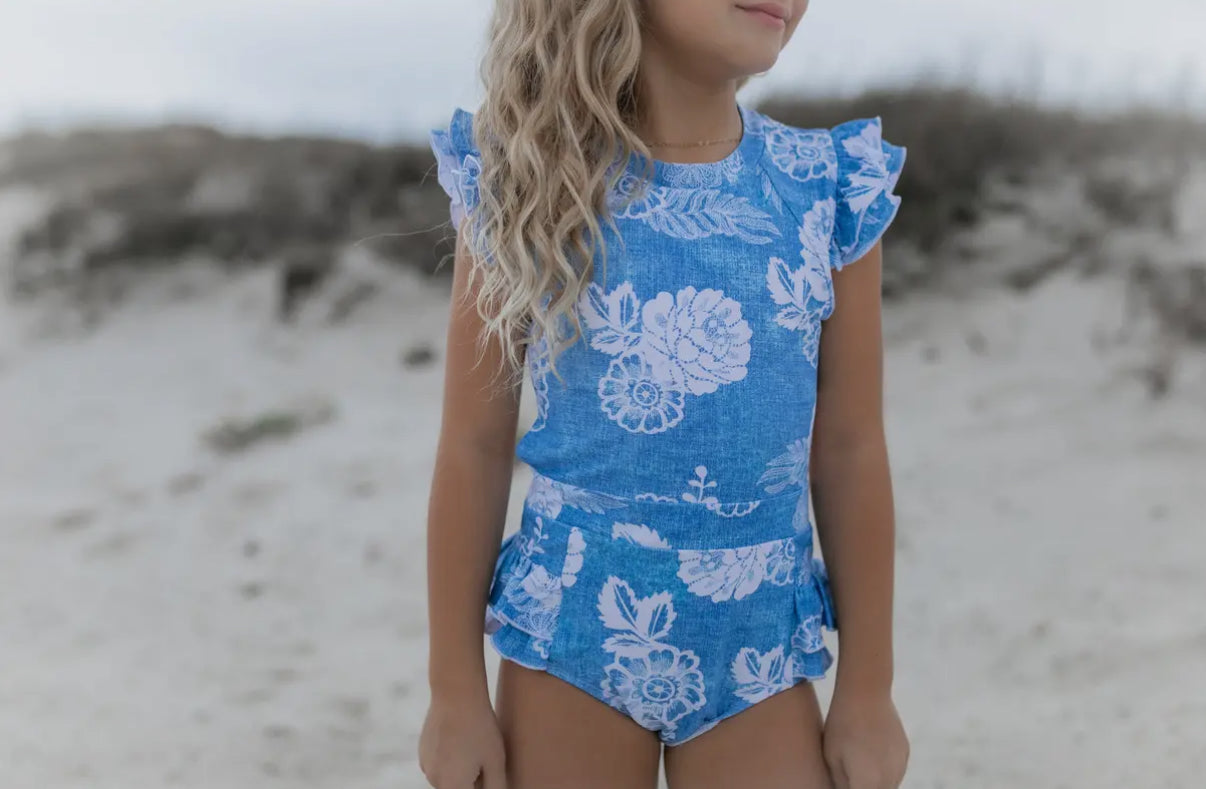 Oopsie Daisy- Kids Blue Floral Open Back One Piece Ruffle Swimsuit