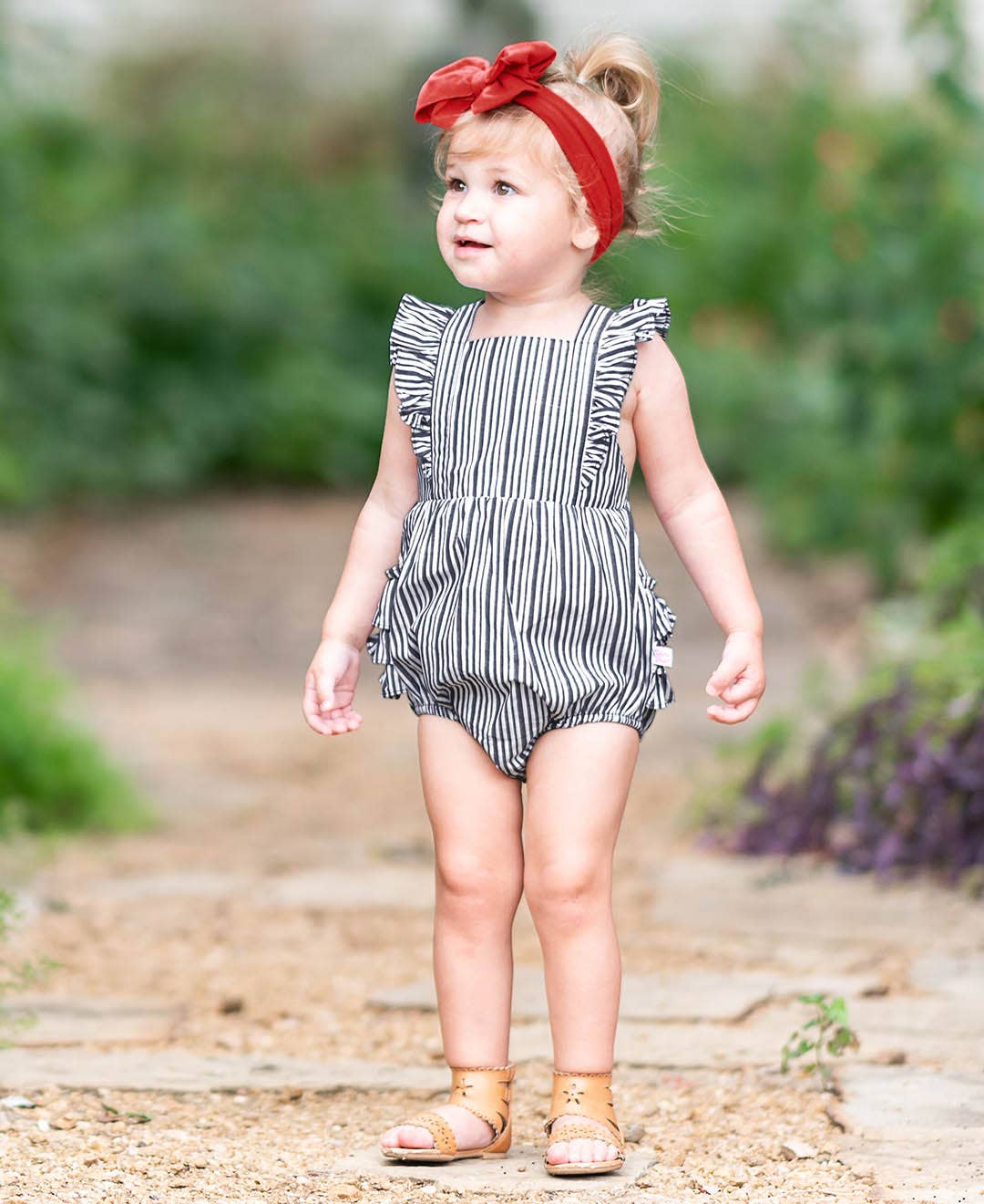 RuffleButts + RuggedButts - Baby Girls Navy Micro Stripe Woven Pinafore Cross-Back Bubble Romper