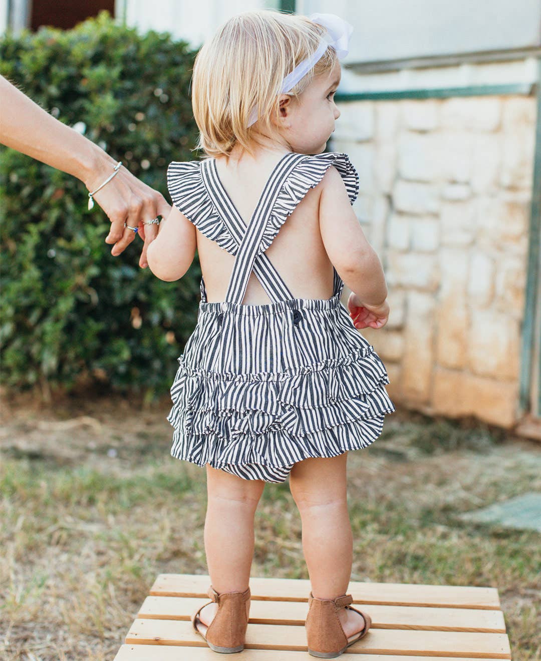 RuffleButts + RuggedButts - Baby Girls Navy Micro Stripe Woven Pinafore Cross-Back Bubble Romper